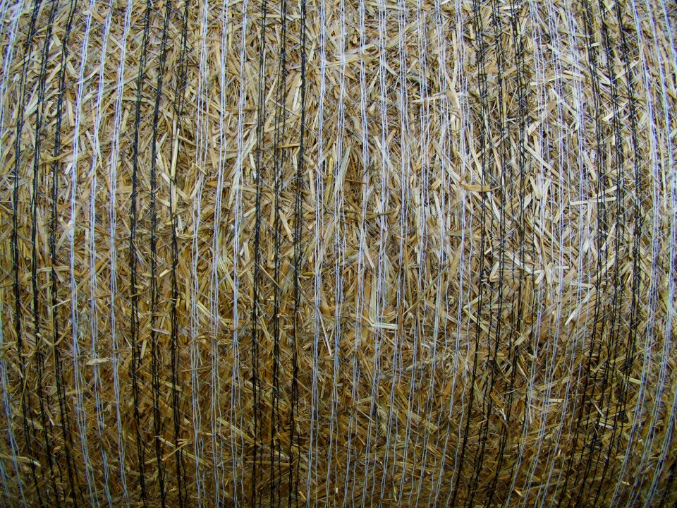 Straw bale compressed grain drying works
