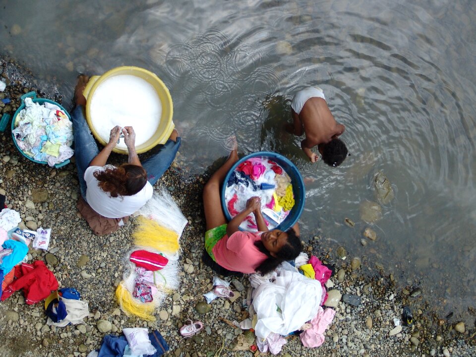Poverty hand washing hard work