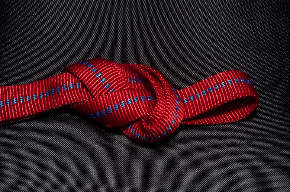Red hose band knotted