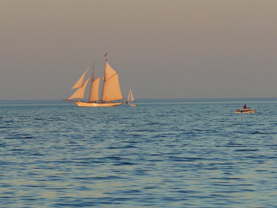 Evening sky sailing boat sea