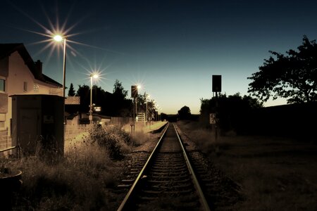 Railway rails lighting photo