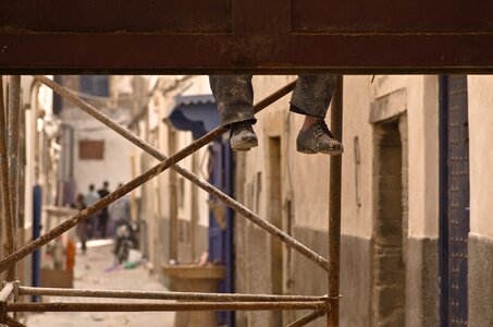 Feet construction workers scaffold