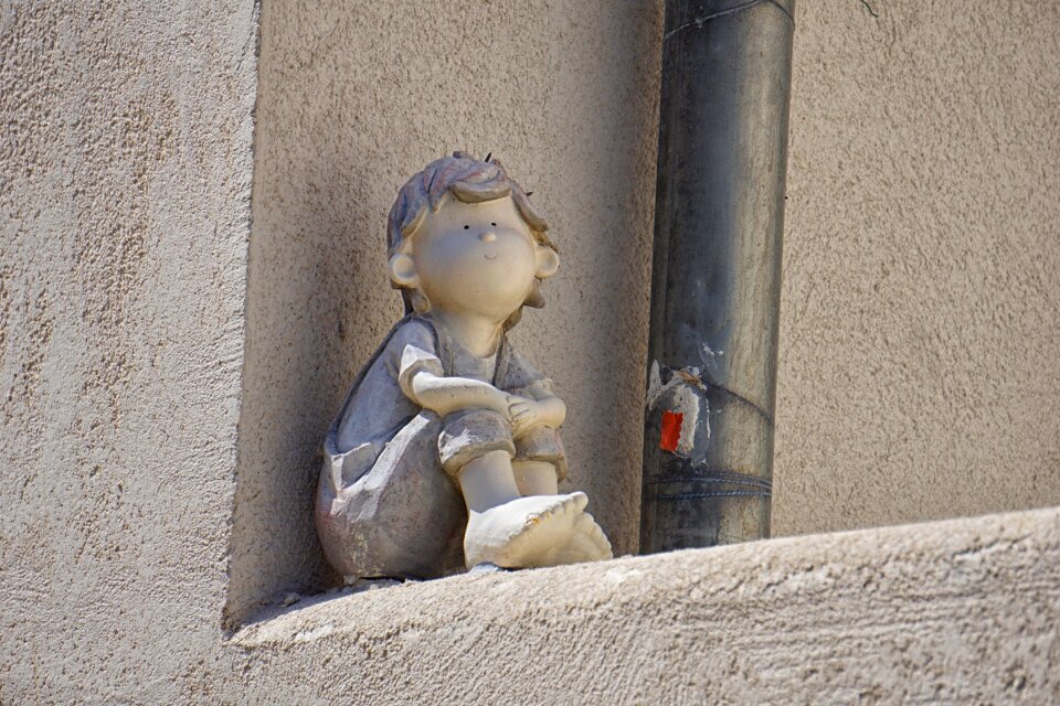 Statue earthenware boy