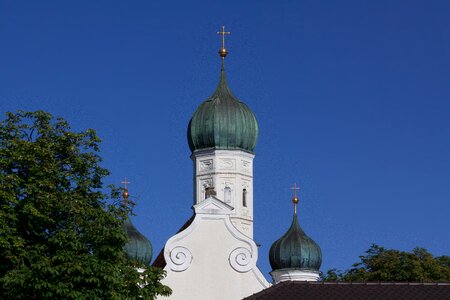 Copper roof cross gilded photo