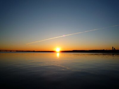 Sunrise haneda offshore contrail