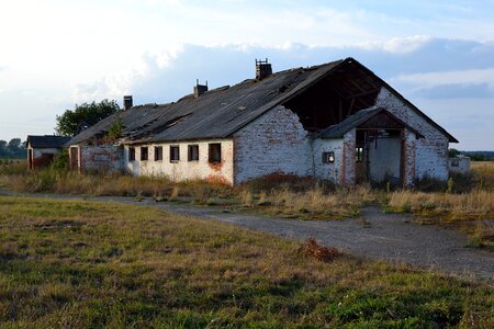 An abandoned building the ruins of the agriculture