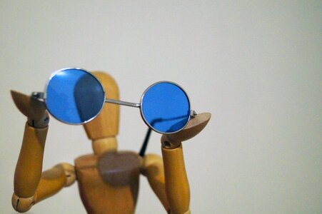 Wood manikin showing blue