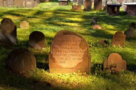 Tombstone old cemetery sun photo