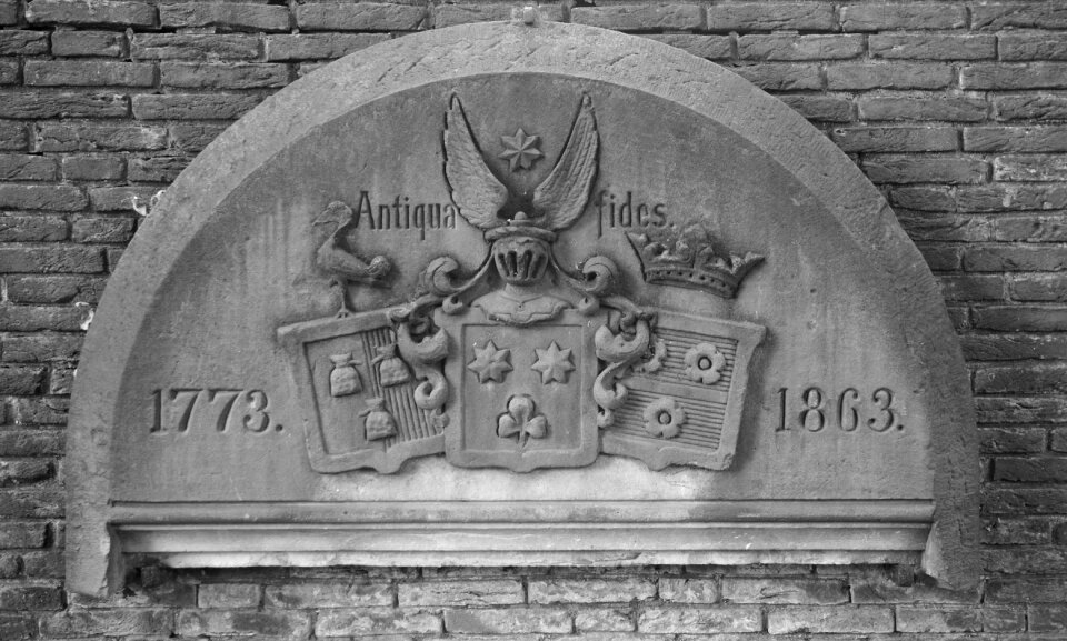 Old town gate planned un blomen of obsolete believe