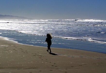 Child sand sea ​​waves