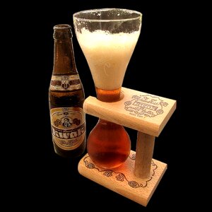Beer bottle isolated amber