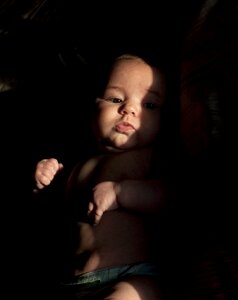 Baby chiaroscuro girl