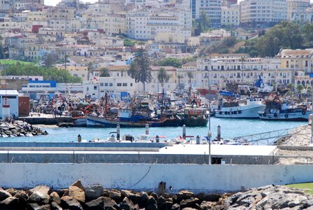 Fishing boats panorama city photo