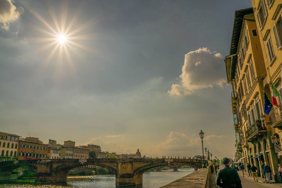 Arno river people walking photo