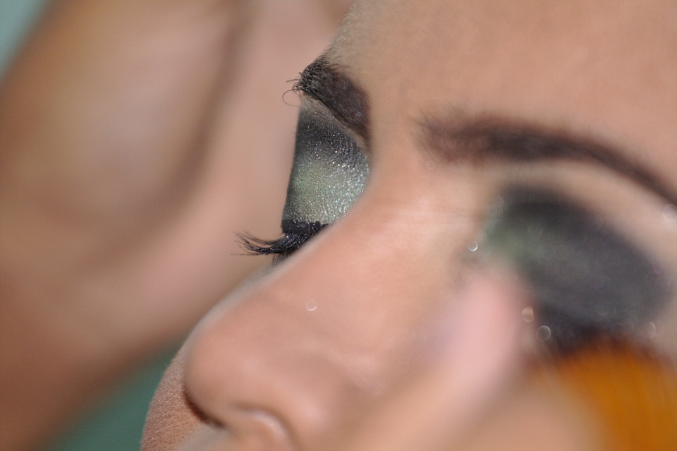 Woman shadows eyeliner