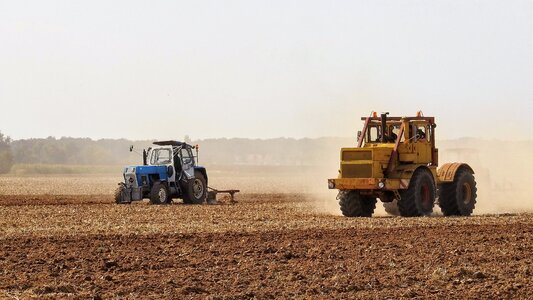 Tractor field ploughing