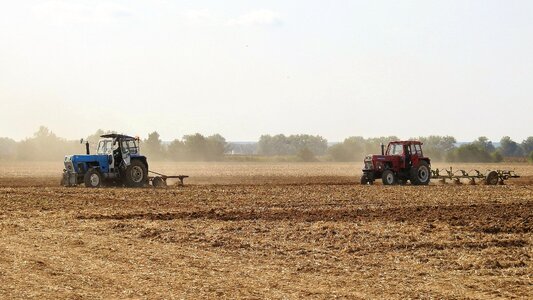 Tractor field ploughing