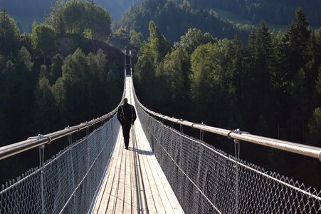 Rope bridge mountain tourism photo