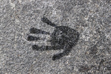 Stone hand handprint photo