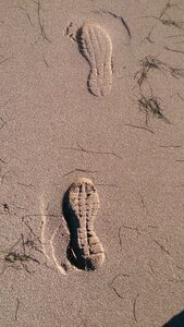 North sea footprint tracks in the sand