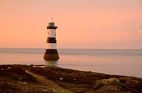 Lighthouse coast sea photo