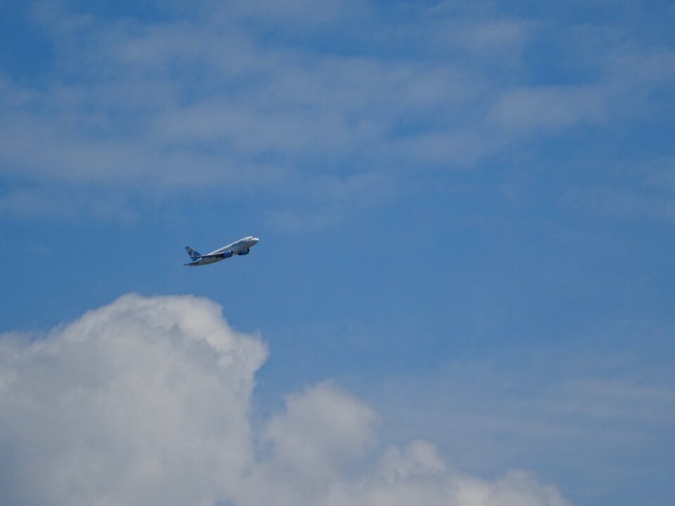 On the cloud passenger aircraft machine photo