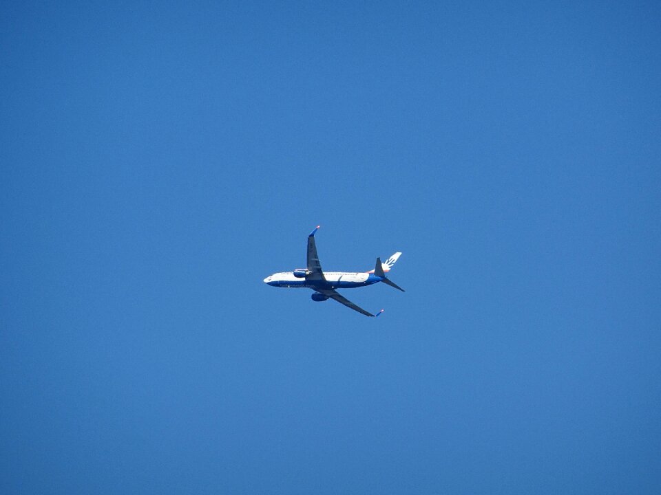 Aircraft wing sky blue photo