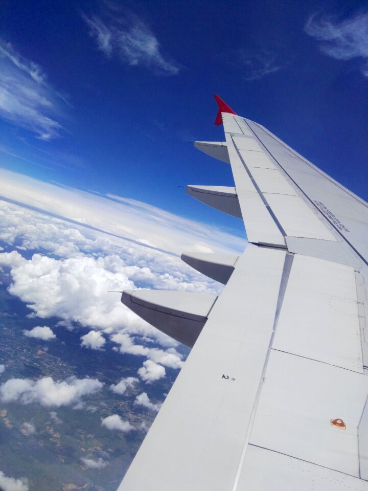 Sky flying above the clouds