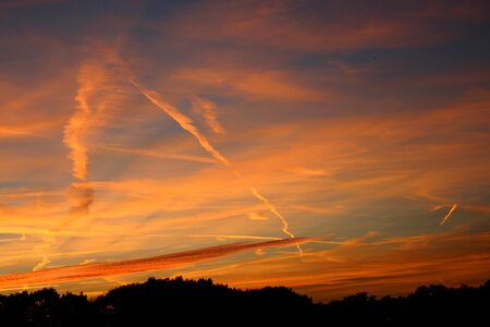 Air trails sunset photo