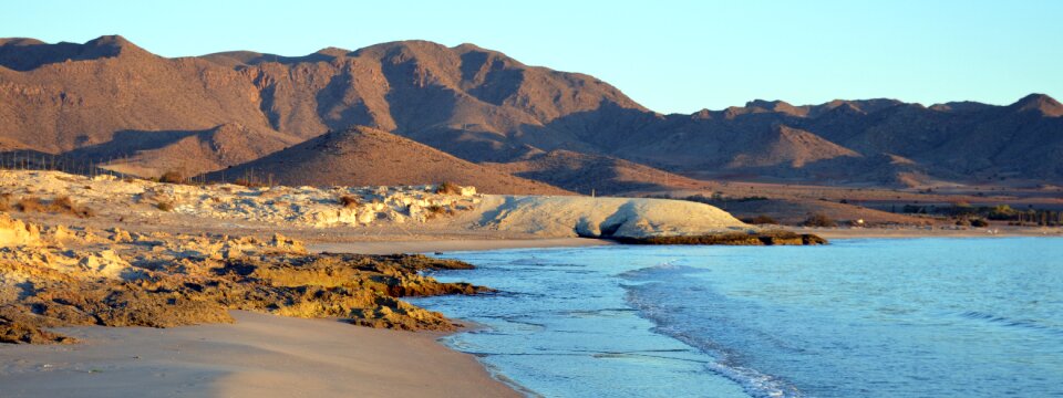 Holiday beach sand edge of the sea photo