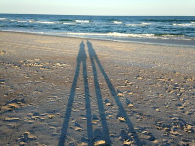 Sand people silhouette photo