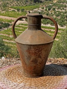 Old sheet metal carafe