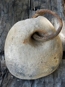 Old weight ring iron