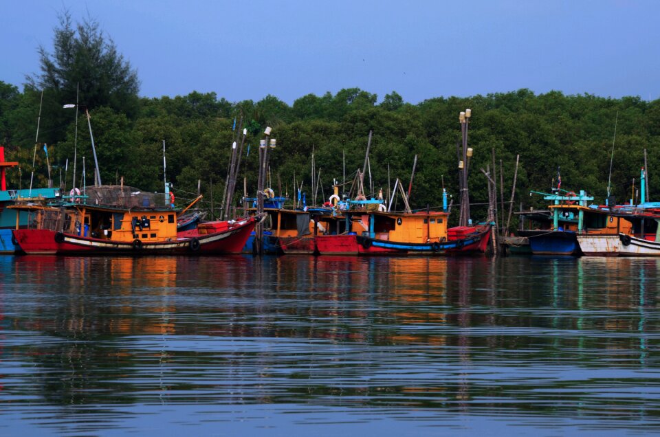 Fisherman fishing beach