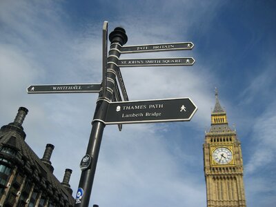 Clock buildings sky photo