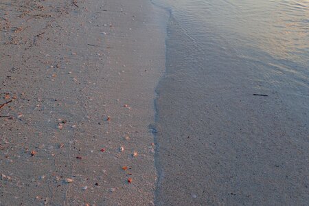 Pebble stones promenade by the sea photo