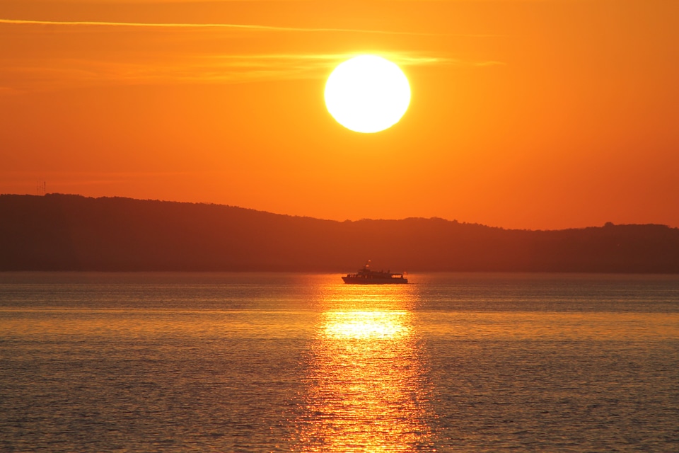 Sunset water lake balaton photo