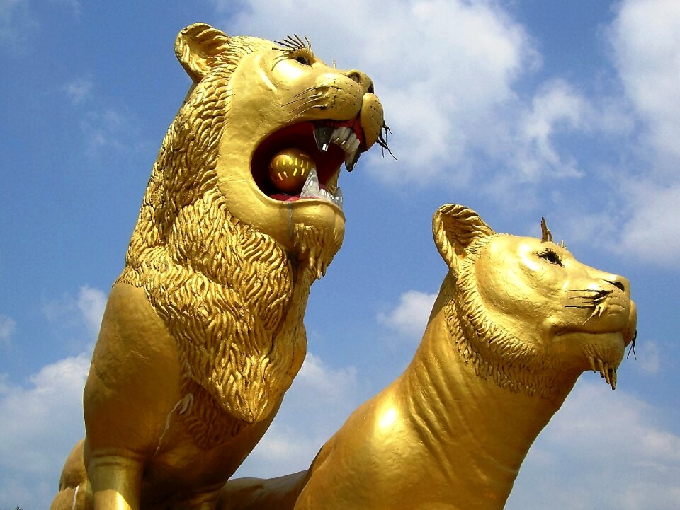 Lion gold work of art