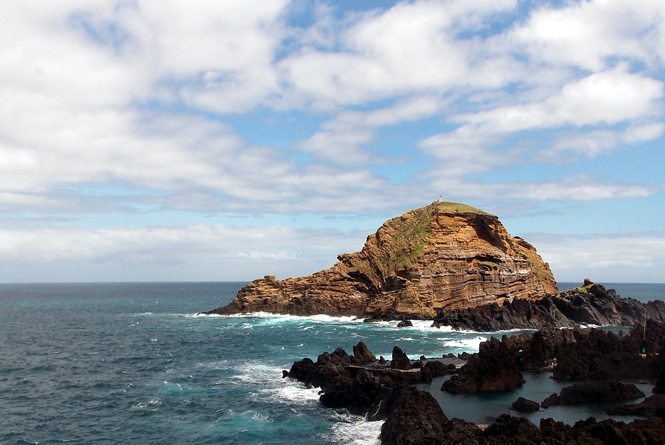 Rock cliff ocean photo