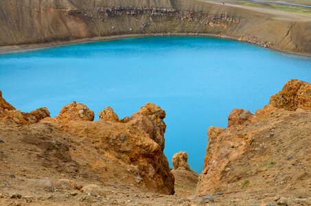 Crater lake turquoise rock photo