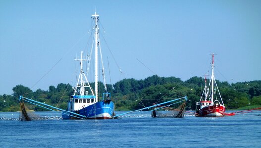 Seafaring fishing vessel blue photo