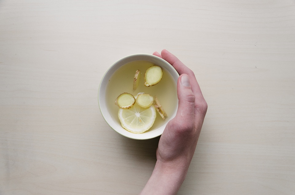 Lemon hot beverage hand photo
