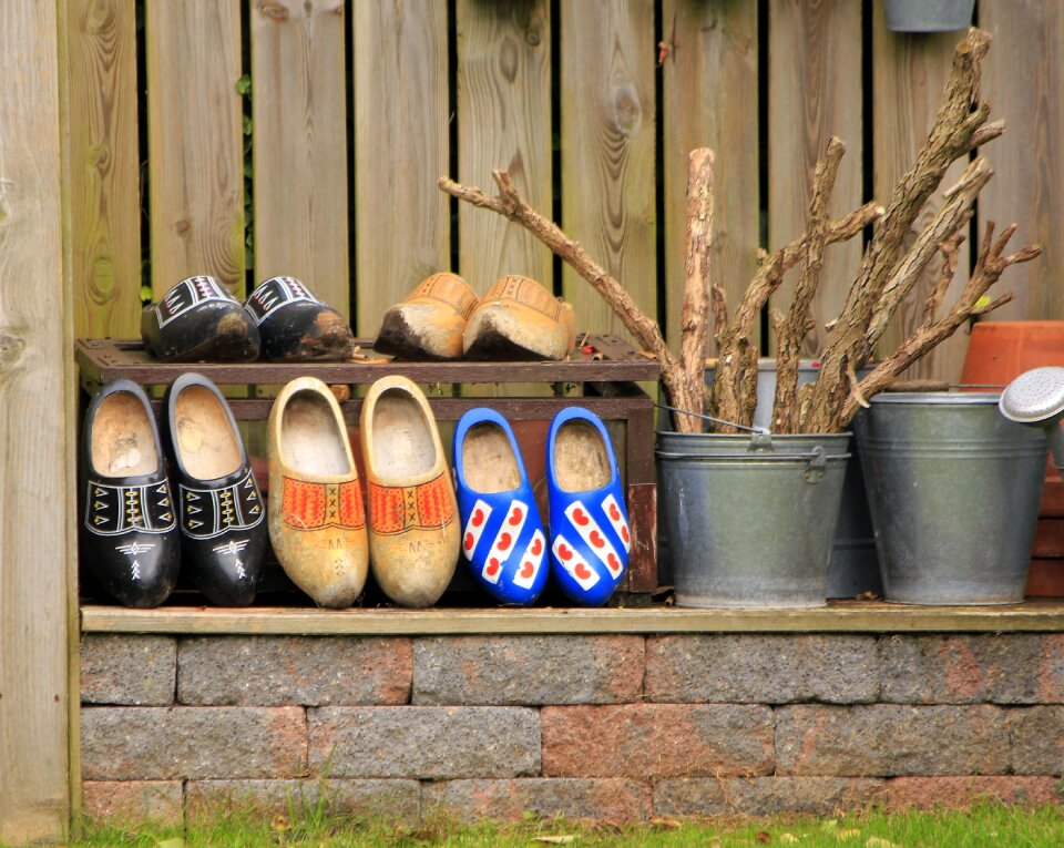 Typical shoes garden shoe on the wall