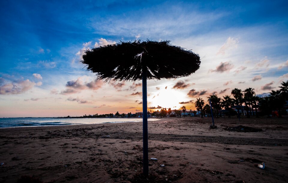 Beach umbrella the sunset