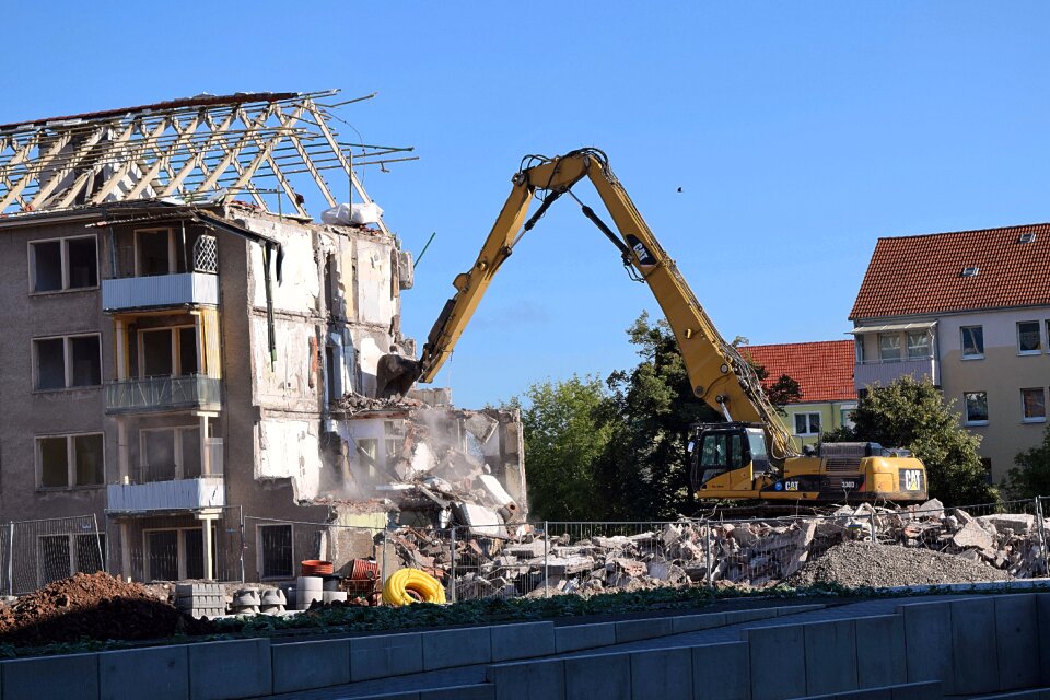Excavators building rubble demolition work