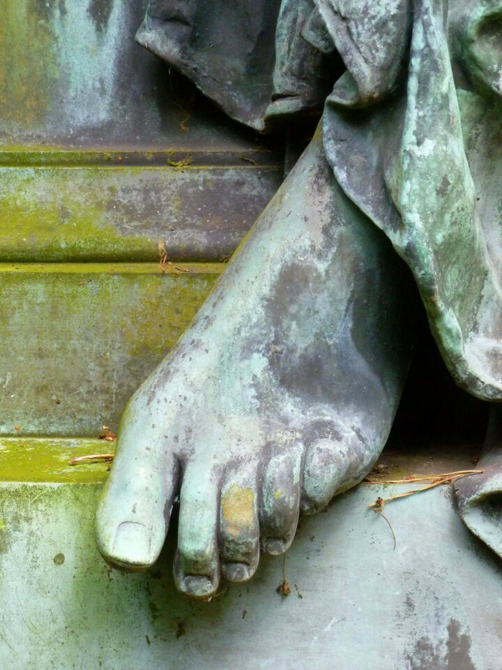 Stone bronze figure