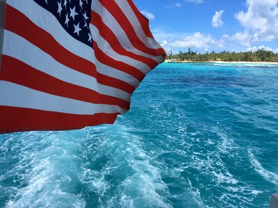 American flag the waves saipan photo