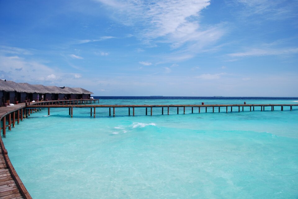 Beach white sands wooden pier