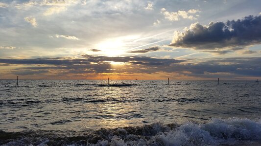 Waves clouds horizon
