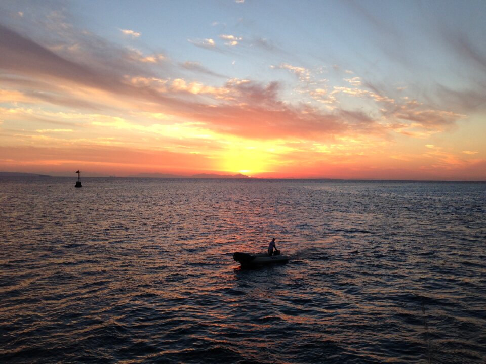 Sunset red sea fisherman